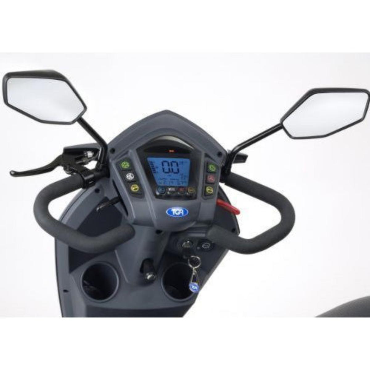 Close-up of a Heartway Vita Monster S12X Mobility Scooter handlebar with digital display and mirrors on a white background