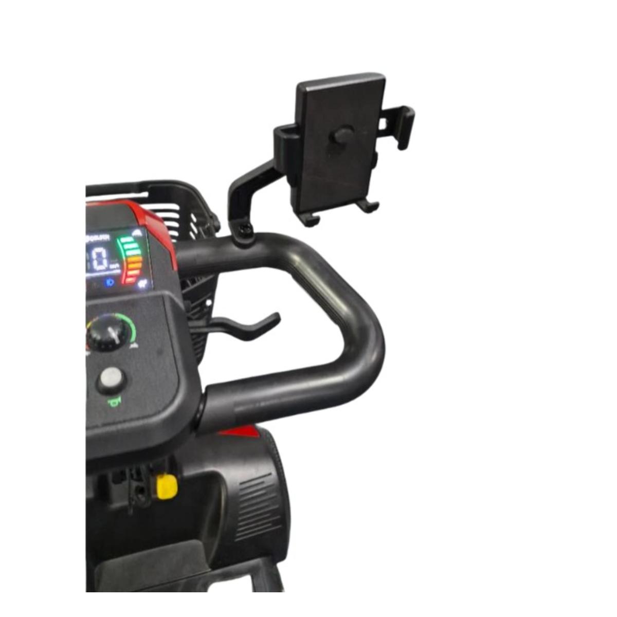 Close-up of a mobility scooter handlebar with control panel and phone holder on a white background