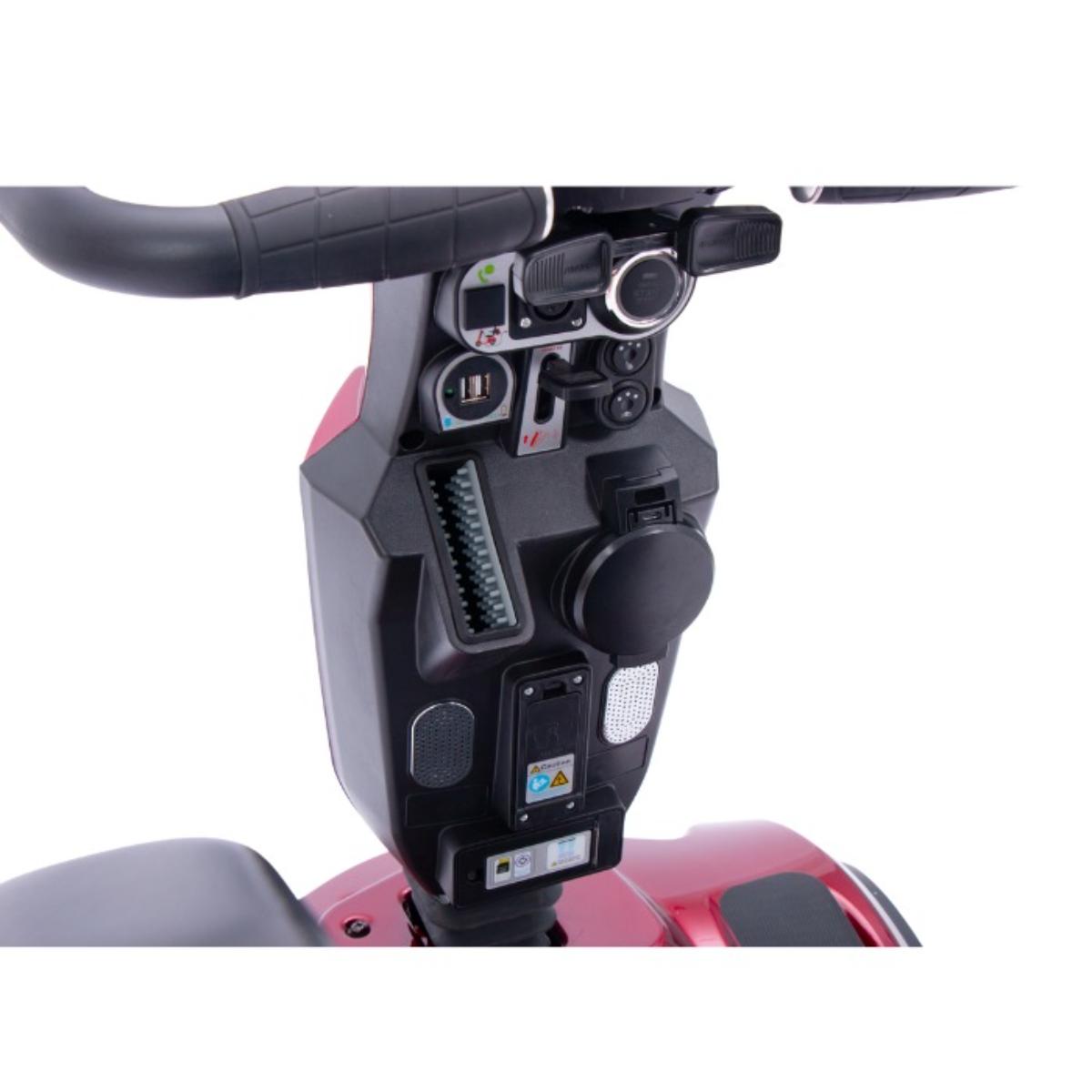 Close-up of a Blazer Pro TopGun Mobility scooter handlebar with control buttons on a white background