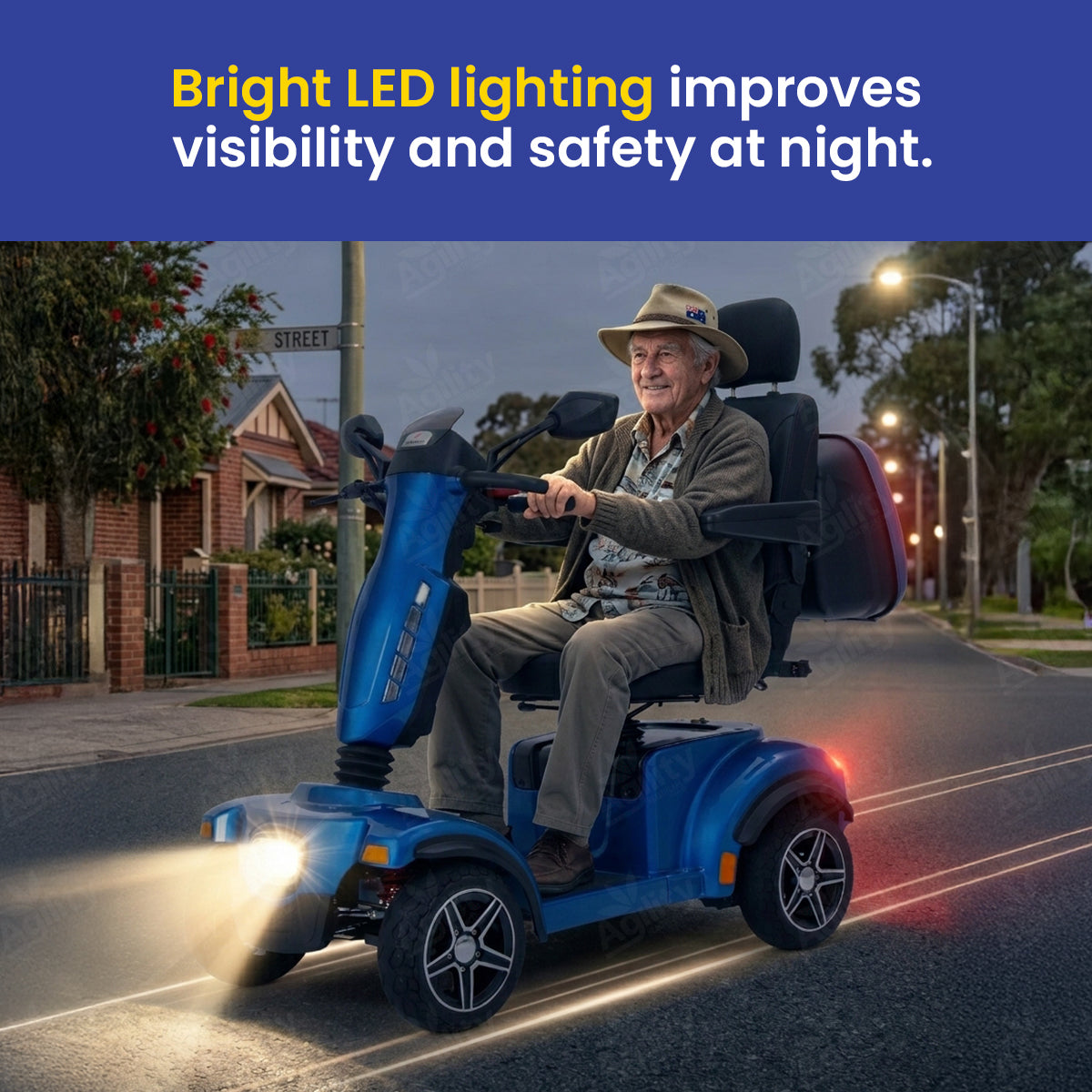 Man riding a blazer mobility scooter on a street at night with bright LED lights.