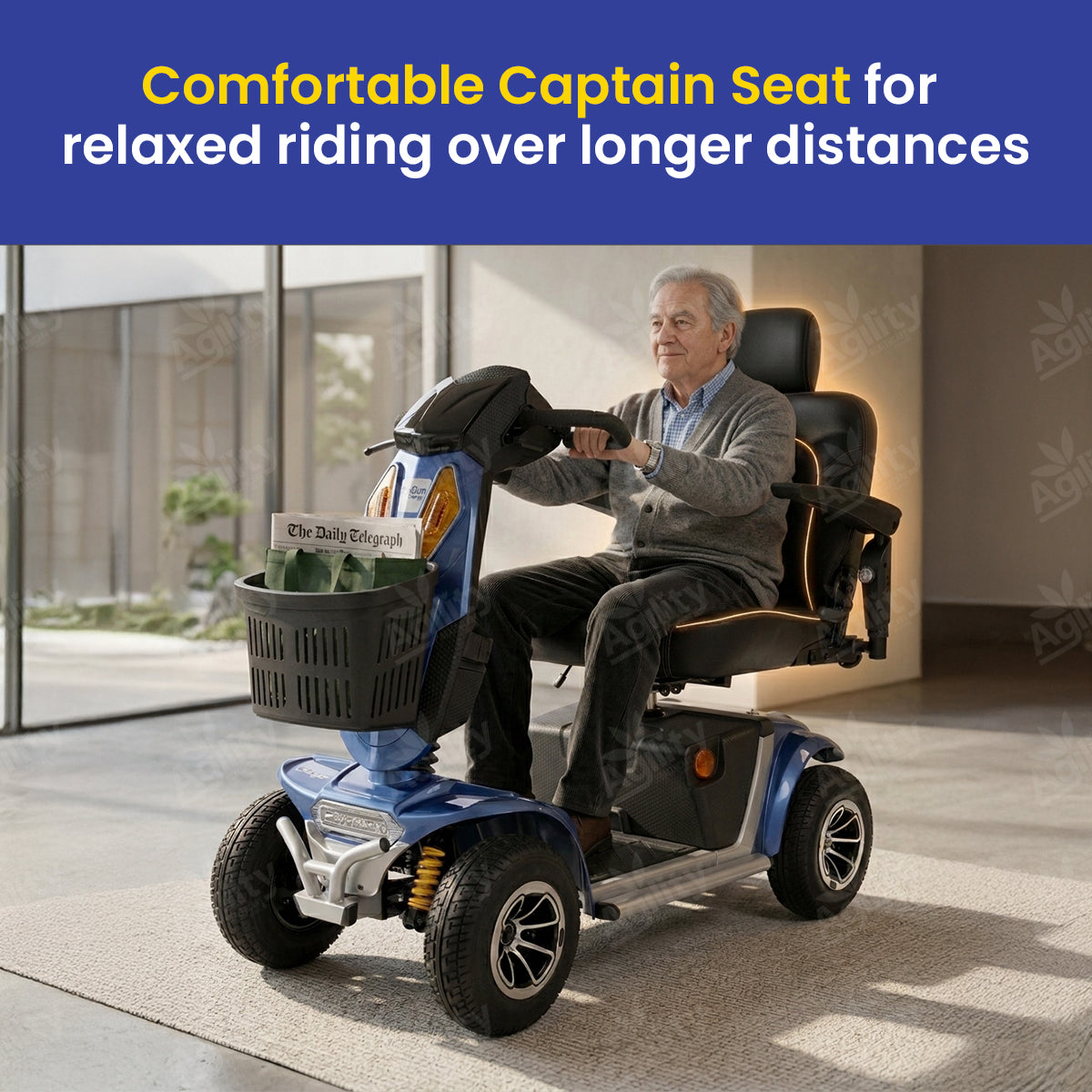 A man is using a charger mobility scooter with a comfortable captain's seat in an indoor setting.