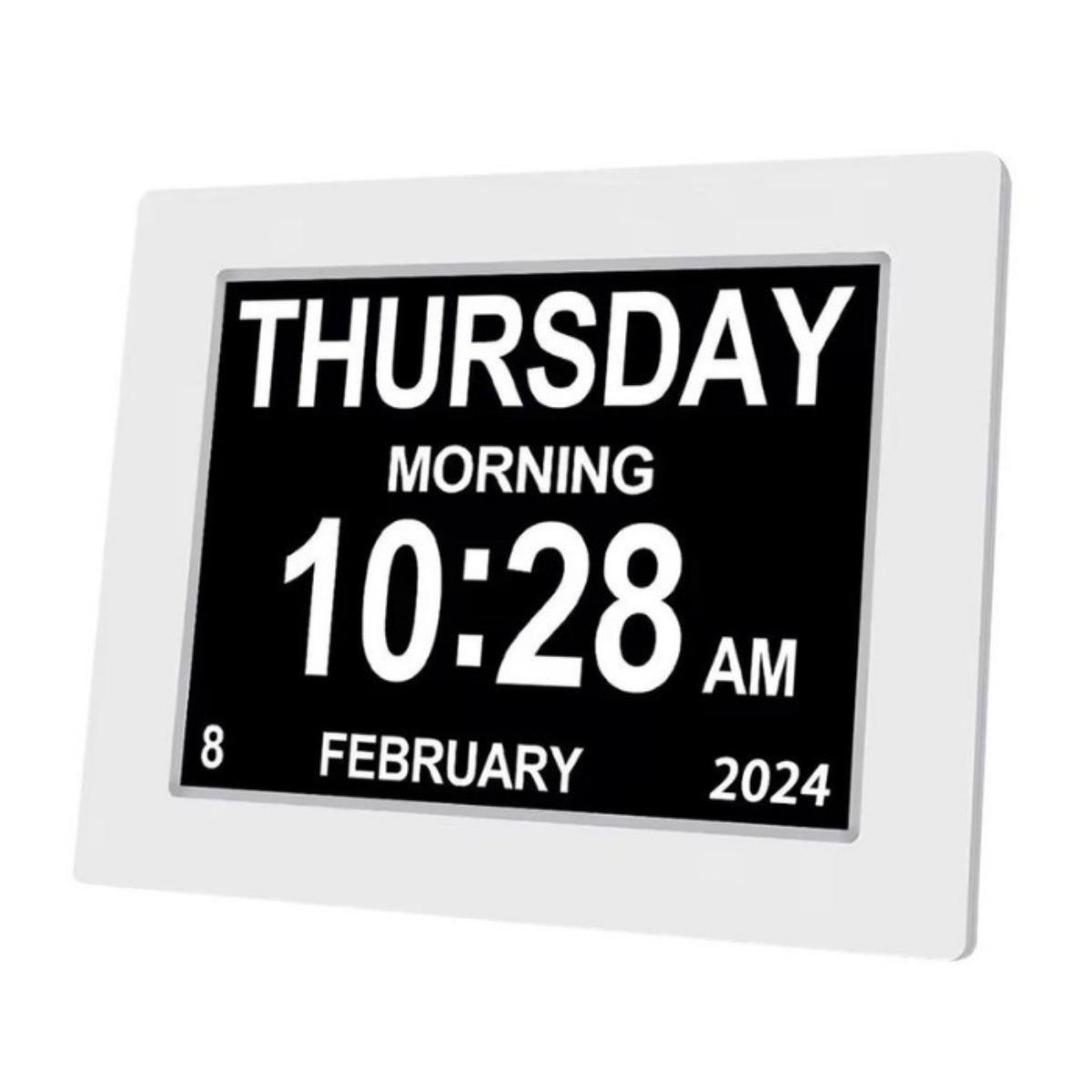 Dawn clock displaying date, time, and day on a white background