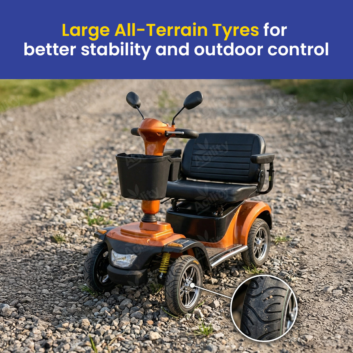 Emperor mobility scooter with large all-terrain tyres on a gravel path, emphasizing stability and control.