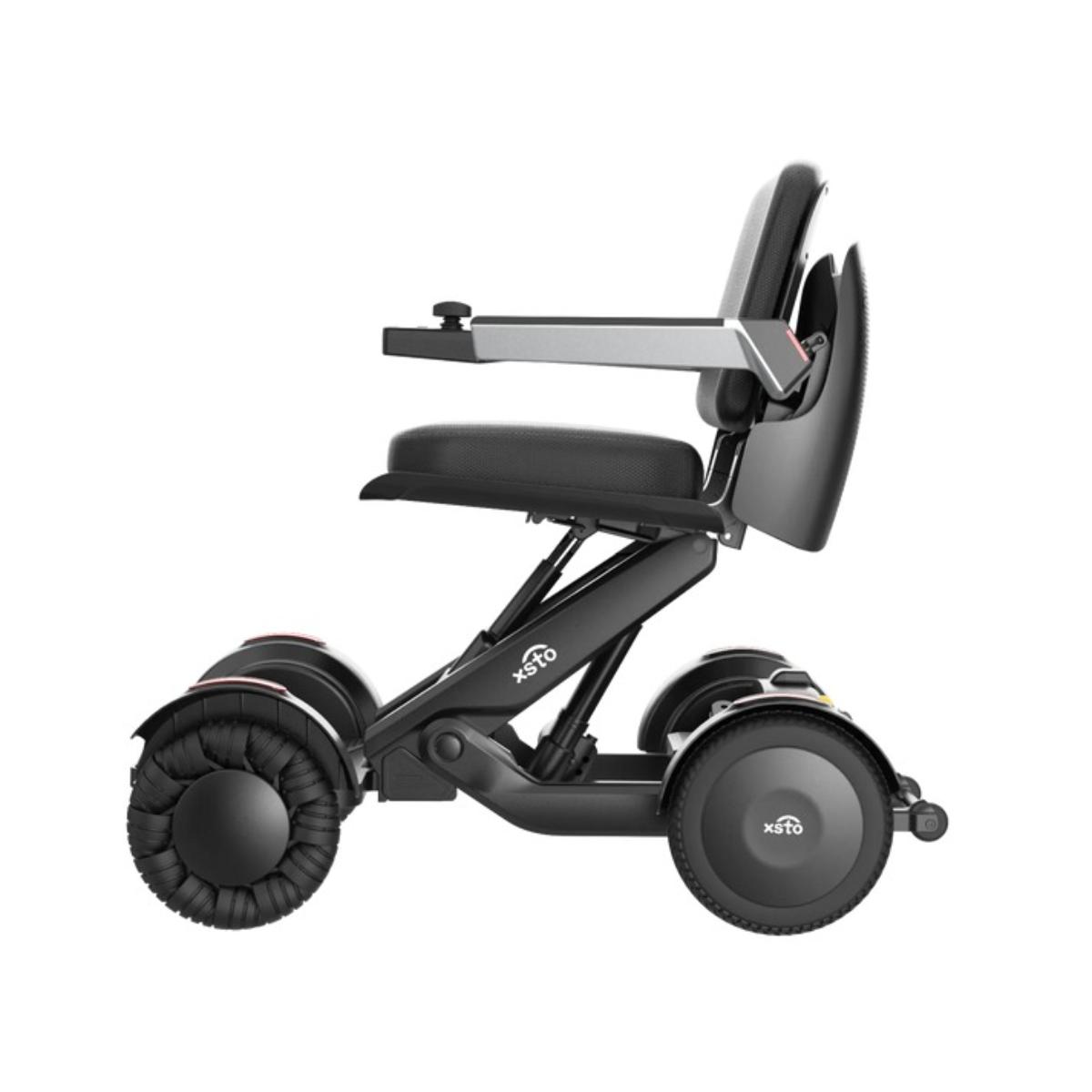 Black electric M4 Power wheelchair with large wheels on a white background