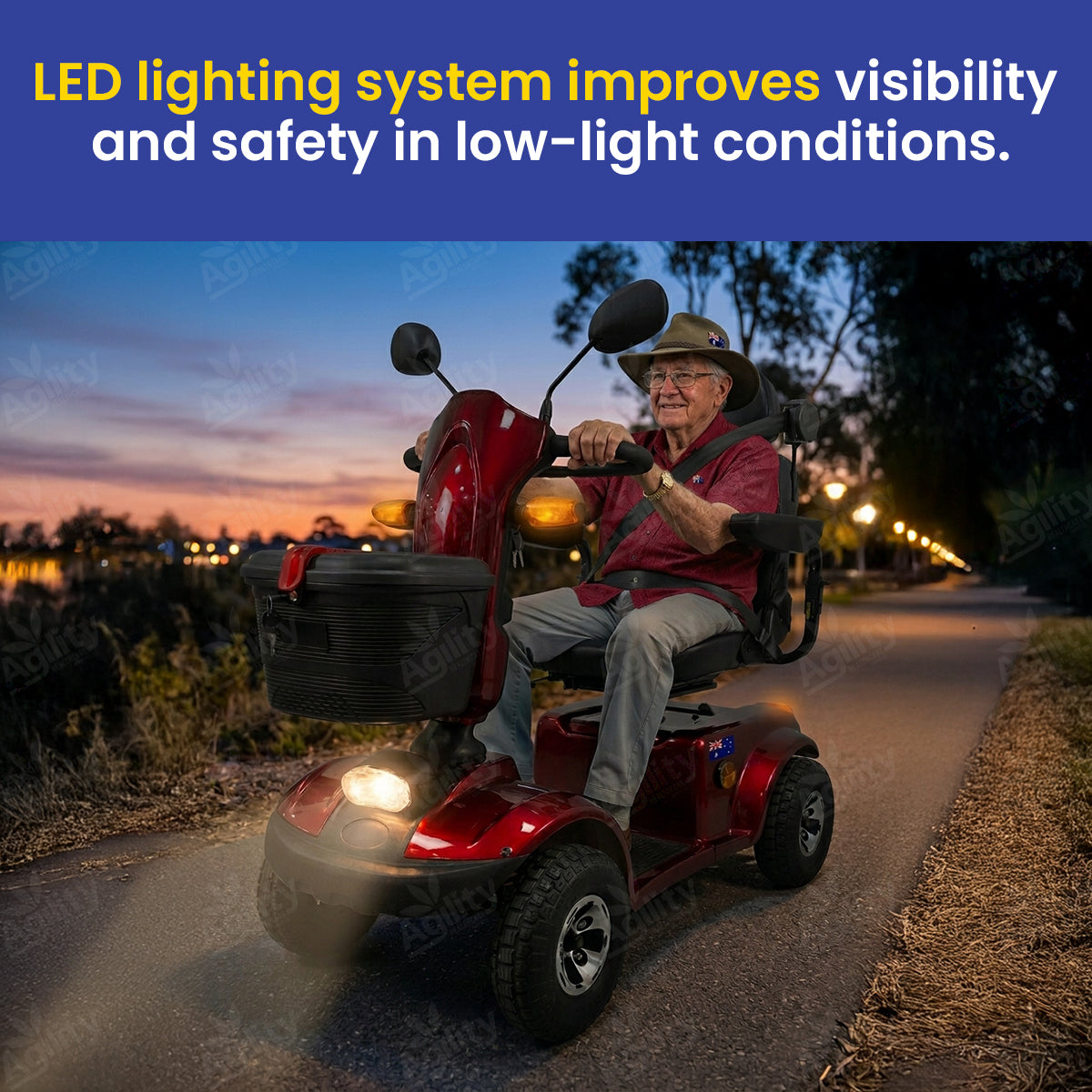 Man riding an outlaw mobility scooter with an LED lighting system on a road at dusk.