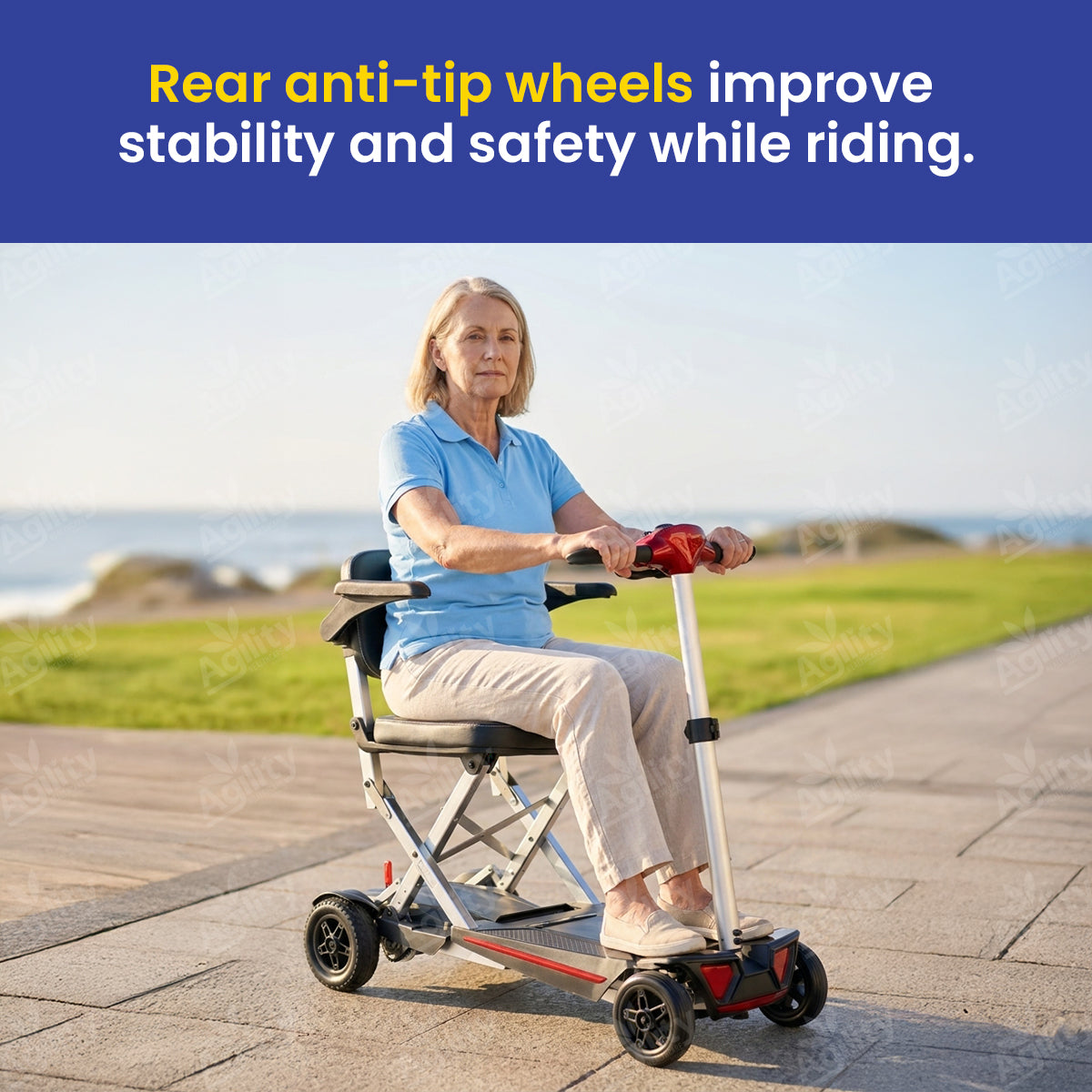 Woman riding a Solax MobiFree Folding Mobility Scooter with rear anti-tip wheels on a paved path.