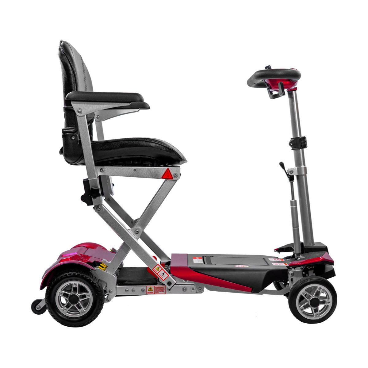 Solax Transformer Comfort Pro Red mobility scooter with a seat on a white background