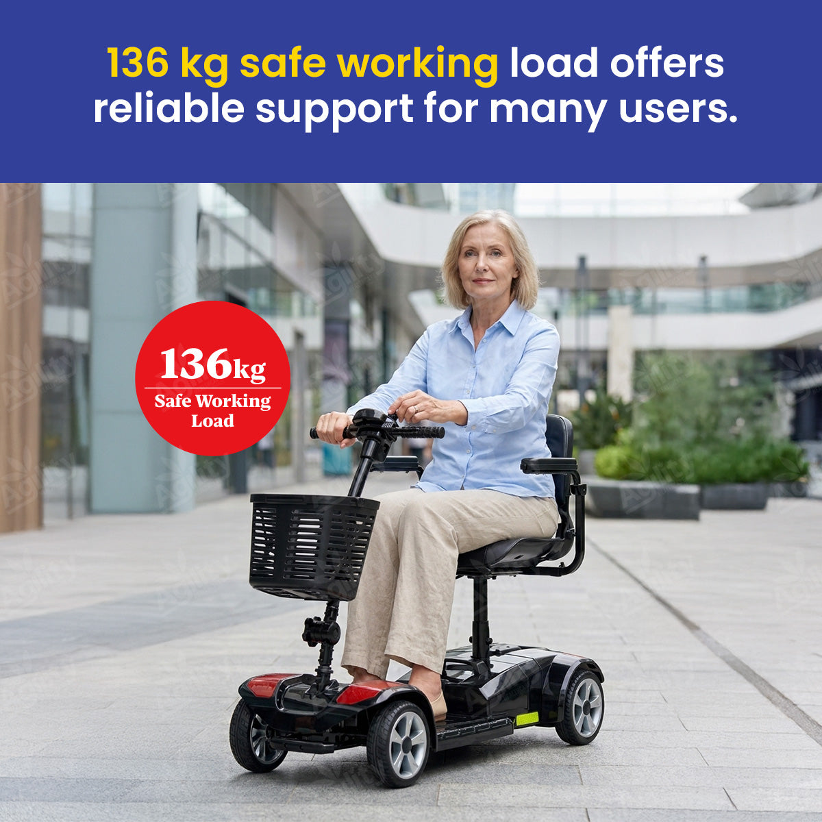 Woman using a Topgun Stylz4 4-Wheel Mobility Scooter with a 136 kg safe working load label in an urban setting.