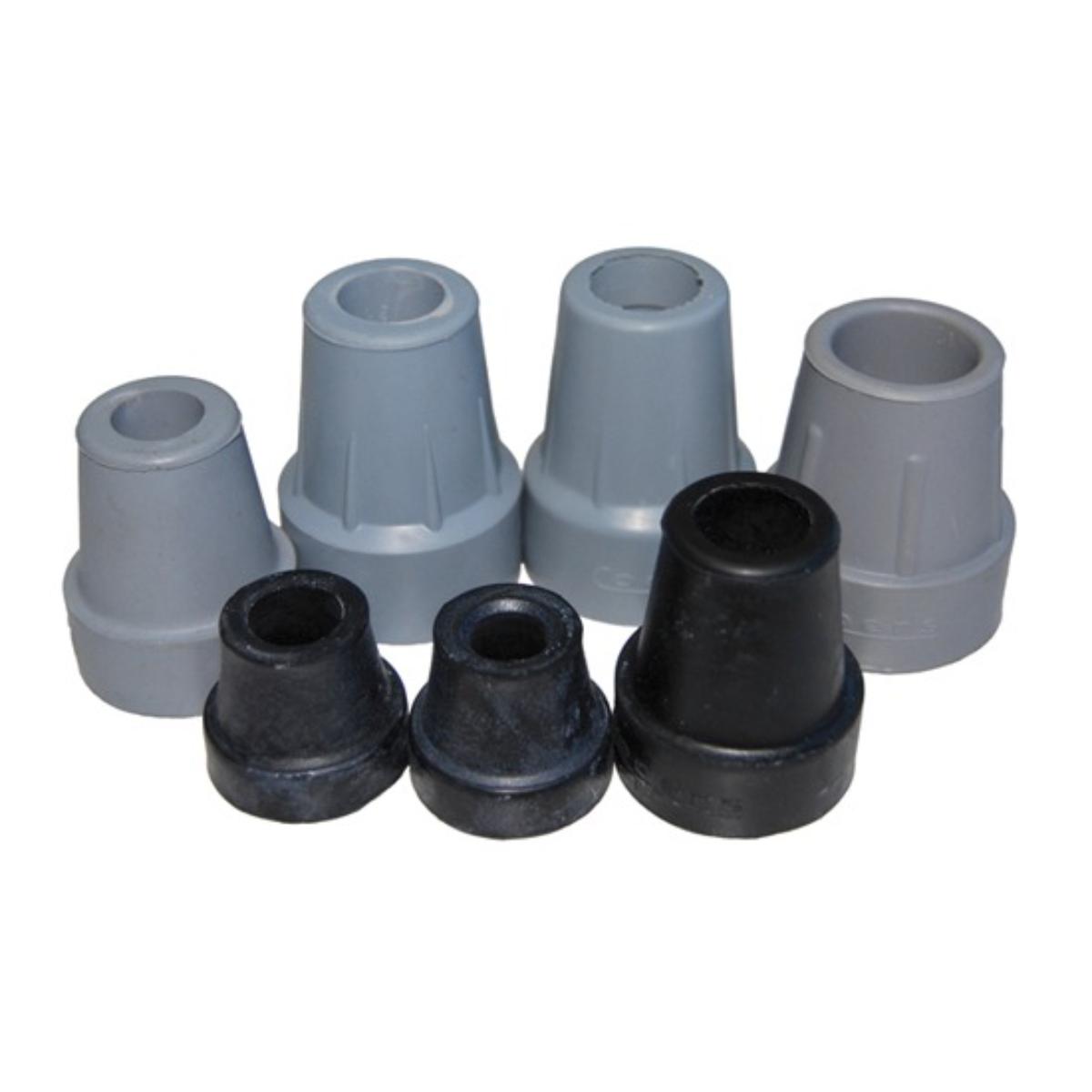 Set of gray and black rubber bushings on a white background